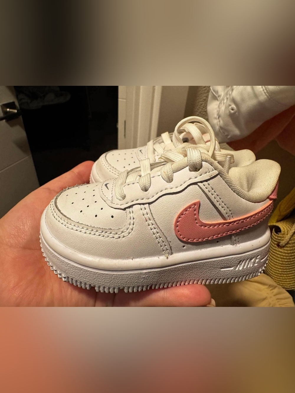 Nike Kids White Sneakers with Pink Swoosh Accent